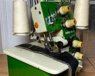 Baby Lock EA-605 serger sewing maching with serger books