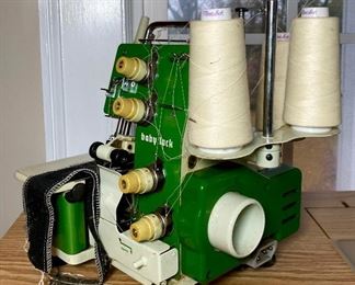 Baby Lock EA-605 serger sewing maching with serger books