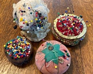 Sewing pins and pin cusions