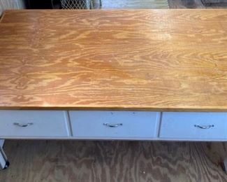 Three drawer roll around work table