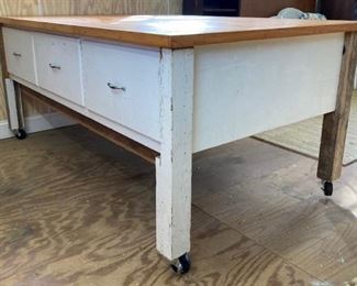 Three drawer roll around work table