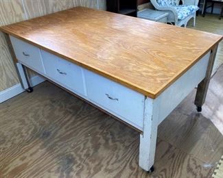Three drawer roll around work table