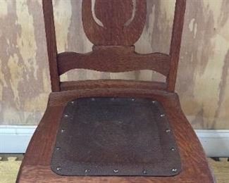 Antique leather bottom chair