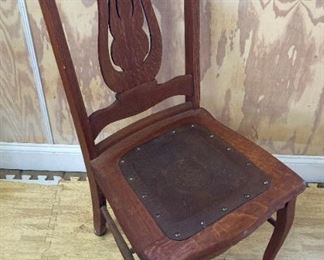 Antique leather bottom chair