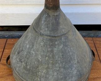 Antique metal funnel