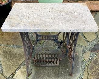 Singer iron sewing table base with marble top