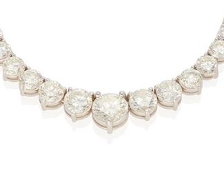 5
A Diamond Necklace
18k white gold; Stamped: 18k
Set with ninety-six round full-cut diamonds graduating in size with the center diamond weighing 2.29cts. and graded J-K color and I1 clarity and the combined diamond weight totaling 29.31cts. and graded J-K color and J-L in color and SI1-I1 in clarity
16.5" L <br /> 16.5" L
40.1 grams
Estimate: $30,000 - $40,000