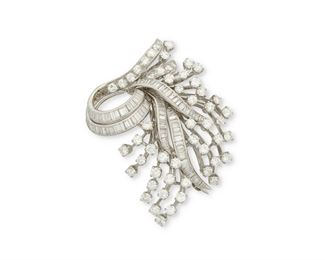8
A Diamond Foliate Brooch
Circa 1950, platinum
Set with fifty-six round full-cut diamonds and one hundred four baguette-cut diamonds totaling approximately 9.00cts. in weight and graded G-H color and VS clarity
1.75" W x 2.125" H
15.9 grams
Estimate: $5,000 - $7,000