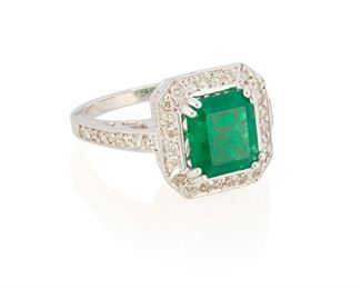 13
An Emerald And Diamond Ring
18k white gold; Stamped: 18k
Centering a rectangular step-cut emerald gauged at 8.7mm x 7.9mm (closed backing) further accented by forty-two round full-cut diamonds totaling approximately 0.65ct. and graded H-I color and SI clarity (0.50" W x 0.50" H)
Ring size: 5.5
7.9 grams
Estimate: $3,000 - $5,000