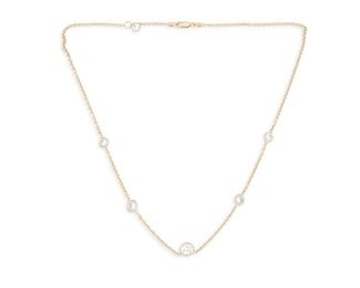 16
A Diamond Collet Necklace
14k yellow and white gold; Stamped: 14k / 585 / Italy
Set with six bezel-set laser-drilled round full-cut diamonds graduating in size weighing exactly 0.98ct., 0.64ct., 0.44ct., 0.42ct., 0.40ct., and 0.34ct. and each graded J-K in color and SI2/I1 clarity
17.5" L
4.6 grams
Estimate: $5,000 - $7,000