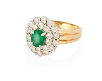 21
An Emerald And Diamond Ring
18k yellow and white gold; Stamped: 18K / Spark
Centering an oval mixed-cut emerald gauged at 6.2mm x 5.0mm x 3.7mm weighing approximately 0.60ct. in weight further set with a double halo of twenty-four round full-cut diamonds totaling approximately 1.50cts. in weight and graded G-H color and VS clarity (0.375" W x 0.50" H)
Ring size: 6.5
6.7 grams
Estimate: $800 - $1,200