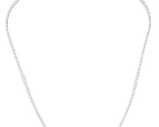 22
A Long Diamond Necklace
18k white gold; Stamped: 750
Set with three-hundred and eight round full-cut diamonds undulating in size totaling 17.86cts. in weight and graded H-I color and SI1-I2 in clarity
32.0" L
32.8 grams
Estimate: $10,000 - $15,000