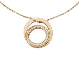 25
An Etincelle De Cartier Pendant Necklace
18k rose gold; Pendant stamped: Cartier / AWC192 / AU750 / ©; Chain Stamped: AU750 / Cartier/ ©
Set with thirty-two round full-cut diamonds totaling 0.14ct. and graded E-F color and VS clarity
0.625" W x 0.75" H x 16.5" L (or 15.25" L)
5.1 grams <br />
2 pieces
Estimate: $700 - $900
