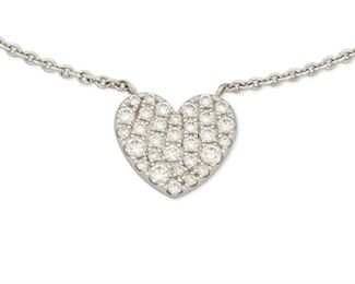 26
A Tiffany & Co. Heart Shaped Diamond Pendant Necklace
18k white gold; Stamped: 750 / Tiffany & Co. / AU
Set with thirty-one round full-cut diamonds totaling approximately 0.60ct. in weight and graded E-F color and VS clarity
0.375" Dia x 16.0" L
3.4 grams
Estimate: $500 - $700