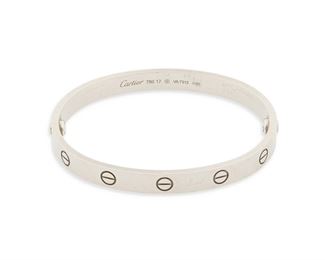 27
A Cartier LOVE Bracelet
18k white gold; Stamped: Cartier / 750 / 17 / © / VA7312 / Assay marks
Oval detachable bangle bracelet in a size 17
0.25" W x 6.25" Cir
33.4 grams
2 pieces
Estimate: $4,000 - $6,000