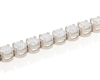 32
A Diamond Line Bracelet
Platinum; Stamped: 950PT
Set with thirty-four round full-cut diamonds totaling 13.40cts. in weight and graded F-H in color and SI clarity
0.1875" W x 7.0" L
22.9 grams
Estimate: $20,000 - $30,000