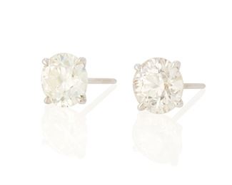 35
A Pair Of Diamond Stud Earrings
18k white gold; Stamped: 18k
Set with two old European-cut diamonds each weighing 1.91cts. and 2.21cts. and graded L-M color and SI clarity
2.8 grams
2 pieces
Estimate: $15,000 - $20,000