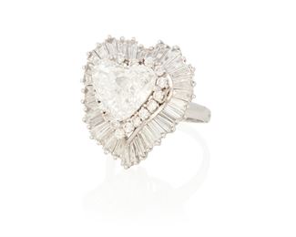 36
A Diamond Ring/Pendant
Platinum; Stamped: Platinum
Centering a heart modified brilliant-cut diamond weighing 3.51cts. with a GIA report dated September 28, 2022 stating I color and SI2 clarity set into a ballerina style ring/pendant accented with nine round full-cut diamonds and thirty-five tapered baguette-cut diamonds totaling approximately 2.75cts. in weight and graded H-I color and VS clarity (0.875" Dia)
Ring size: 7.25
16.4 grams
3 pieces
Estimate: $15,000 - $20,000