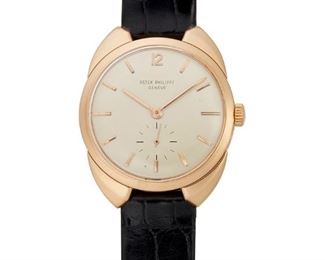 39
A Patek Philippe Gold Wristwatch
1954, 18k rose gold <br /> Ref #2548
With a circular silvered dial with applied pink gold baton hour markers
Sub-seconds dial, signed Patek Philippe Geneve, an 18 Jewel stem-wind and set movement, Cal: 10-200, No: 743111, lever escapement, monometallic self-compensation Breguet balance with precision micrometer regulator, signed Patek Philippe & Co. Geneve within an 18k pink gold smooth polish case with stylized 'winged' lugs, signed Patek Philippe Geneve, Ref: 2548, Case No. #423111, hallmarked, skin strap,
With stock box
39mm x 34mm
41 grams
Estimate: $10,000 - $15,000