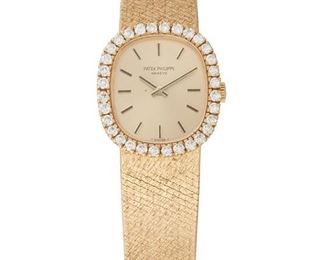 44
A Patek Philippe Diamond Wristwatch
1975 <br /> Ref: 4134/1
With a cushion shaped champagne dial, signed Patek Philippe Geneve, an 18 jewel stem and set movement, Cal: 16:250, #1268786 within an 18k yellow gold case with integrated textured bracelet and a bezel set with thirty-two diamonds, signed Patek Philippe Geneve, hallmarked, case: #2746428, personalized engraving to rear case
23mm x 21mm
59 grams
Estimate: $2,000 - $3,000