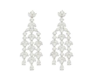 55
A Pair Of Diamond Chandelier Earrings
18k white gold; Stamped: 750
Set with eighty-four marquise-cut, pear shaped and round full-cut diamonds totaling 16.72cts. in weight and graded H-K in color and VS2/SI1 clarity
0.875" W x 1.50" H
16.2 grams
2 pieces
Estimate: $20,000 - $30,000