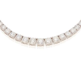 56
A Diamond Necklace
14k white gold; Stamped: 14k
Set with one hundred sixty round full-cut diamonds graduating in size and totaling 10.21cts. in combined weight and each graded G-H color and SI1-I1 in clarity
17.0" L
17.7 grams
Estimate: $6,000 - $8,000