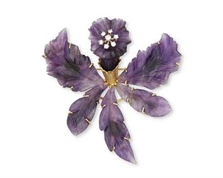 60
A Cellino Carved Amethyst And Diamond Flower Brooch
18k yellow and white gold; Stamped: Cellino / 18k
Designed with six carved amethyst petals topped with seven round full-cut diamonds set "en tremblant" totaling approximately 0.40ct. in weight and graded G-H color and VS clarity
2.875" W x 3.0" H
37.1 grams
Estimate: $1,500 - $2,000
