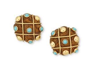 58
A Pair Of Wood And Turquoise Ear Clips
18k yellow gold; Stamped: 750
The circular wood ear clips are topped with a basketweave design of eight 18k yellow gold circles alternating with ten bezel set cone shaped turquoise
0.875" Dia
15.6 grams
2 pieces
Estimate: $2,000 - $3,000