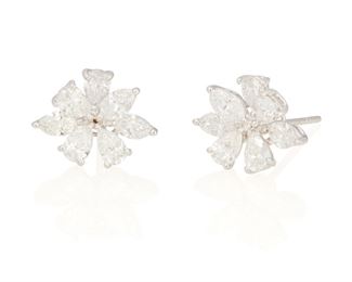 62
A Pair Of Diamond Cluster Earrings
18k white gold
Set with a cluster of six marquise-cut diamonds and eight pear-shaped diamonds totaling 2.68cts. in weight and graded E-F color and VS clarity
0.375" Dia
4.7 grams
2 pieces
Estimate: $7,000 - $9,000