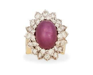 65
A Star Ruby And Diamond Ring
14k yellow and white gold; Stamped: 14k
Centering an oval star ruby gauged at 13.8mm x 10.3mm x 10.4mm further accented by a double halo of thirty-two round full-cut diamonds totaling approximately 3.50cts. in combined weight and each graded G-I color and SI clarity (0.875" W x 1.125" H)
Ring size: 6.75
19.3 grams
Estimate: $4,000 - $6,000