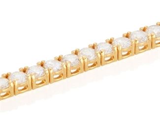 67
A Diamond Line Bracelet
14k yellow gold
Set with sixty-two round full-cut diamonds totaling 5.46cts. in weight and graded G-H color and SI1-I1 in clarity
7.25" L
8.7 grams
Estimate: $2,500 - $3,500