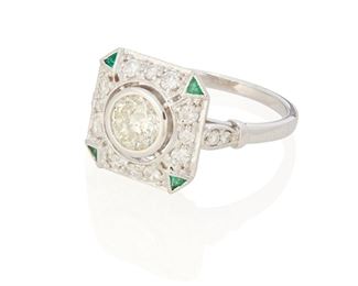69
A Diamond And Emerald Ring
18k white gold; Stamped: 18k
Centering a bezel set round full-cut diamond gauged at 0.75ct. and graded K-L color and I2 clarity further set with sixteen round full-cut diamonds totaling approximately 0.45ct. in combined weight and each graded H-I color and SI clarity and accented with four small triangular-cut emeralds at each corner
Ring size: 7
4.7 grams
Estimate: $1,000 - $1,500