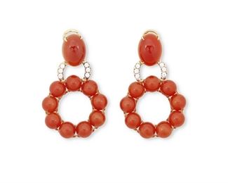72
A Pair Of Carnelian And Diamond Ear Pendants
18k yellow gold
Topped with two oval cabochon carnelian each gauged at 16mm x 12mm further accented by circular drops set with a total of eighteen round carnelian spheres each gauged at 8mm and accented with twelve round full-cut diamonds totaling 0.57ct. in weight and graded H-I color and SI clarity
1.25" W x 2.0" H
33.3 grams
2 pieces
Estimate: $3,000 - $5,000
