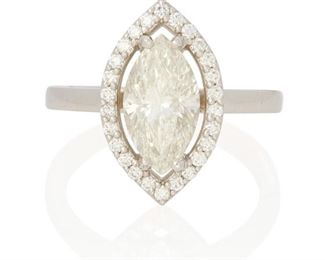 76
A Diamond Ring
Platinum; Stamped: PT950
Set with a marquise brilliant-cut diamond weighing 2.01cts. with a GIA report dated January 3, 2007 stating K color and SI1 clarity further accented by a halo of twenty-six round full-cut diamonds totaling approximately 0.25ct. in weight and graded H-I color and SI clarity (0.50" W x 0.75" H)
Ring size: 6.5
6.9 grams
Estimate: $8,000 - $12,000