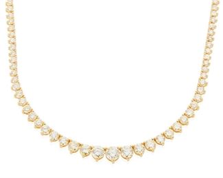 81
A Diamond Riviere Necklace
18k yellow gold
Centering a 0.36ct. round full-cut diamond further set with one hundred sixty-seven round full-cut diamonds tapering in size and totaling 7.83cts. in weight and each graded M+ in color and SI/I clarity
16.5" L
16.3 grams
Estimate: $3,000 - $5,000