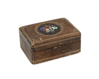 89
An Italian Leather And Pietra Dura Vanity Box
Late 19th/early 20th century
A rectangular tooled leather lined box with inset central pietra dura plaque and lined interior
1.75" H x 4.0" W x 2.75" D
#7501
Estimate: $400 - $600