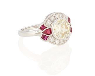 94
A Ruby And Diamond Ring
18k white gold; Stamped: 18k
Centering a bezel set old European-cut diamond gauged at 1.75cts. graded yellow in color and VS in clarity surrounded by ten round full-cut diamonds totaling approximately 0.30ct. in weight and graded H-I color and SI clarity and flanked on either side by six fancy-cut rubies
Ring size: 7
6.0 grams
Estimate: $4,000 - $6,000