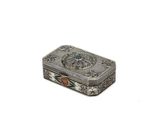 95
A French Silver And Enameled Snuff Box
Late 19th century, silver
A silver rectangular body with fleur de lis design elements with enameled decoration and further set with seed pearls and sapphires, hallmarked
0.75" H x 2.25" W x 1.5" D
#7534
Estimate: $400 - $600