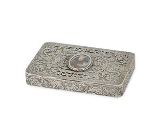 101
A French Silver Snuff Box
Late 19th/early 20th century, silver
Marked
Pierced rectangular box with etched design and an oval portrait plaque of an officer
0.50" H x 3.5" W x 2.25" D
#7533
Estimate: $500 - $700
