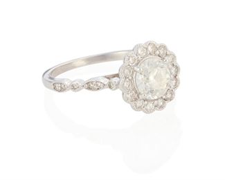 108
A Diamond Ring
18k white gold; Stamped: 18k
Centering a 1.02cts. old European-cut diamond graded I-J color and I1 clarity surrounded by twenty-six round full-cut diamonds totaling approximately 0.40ct. in weight and graded H-J color and SI clarity and finished with milgrain detailing
Ring size: 7
3.5 grams
Estimate: $1,500 - $2,000
