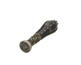 109
An Agate And Jeweled Wax Seal
19th century, silver
A banded agate body with silver mounted bands with inset jewels and a seal intaglio cut coat of arms
4.75" H
#7497
Estimate: $600 - $800