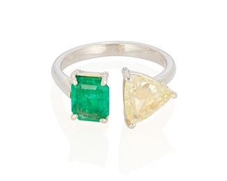 112
A Fancy Yellow Diamond And Emerald Ring
18k white gold; Stamped: 18k
Set with a triangular mixed-cut diamond weighing 1.31cts. with a GIA report dated August 25, 2022 stating natural fancy yellow (uneven color) and an octagonal step-cut emerald weighing 1.03cts. with GIA report dated August 30, 2022 stating natural Colombian origin with moderate clarity enhancement (F2)
Ring size: 6.75
4.2 grams
Estimate: $2,500 - $3,500
