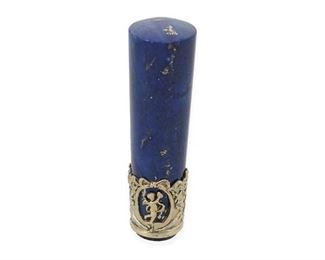 113
A Lapis Lazuli Wax Seal
Late 19th/early 20th century, silver
A lapis body with silver bezel decorated with putti and floral swags
3.875" H
#7523
Estimate: $500 - $700