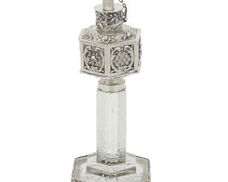 115
A Silver Mounted Crystal Oil Lamp
19th century, silver
marked to base
hexagonal shaped pedestal style crystal body with etched design, silver mounted
6.25" H
#7499
Estimate: $800 - $1,200