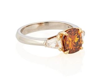 116
A Fancy Deep Brown-Orange Diamond Ring
Platinum & 18k yellow gold; Stamped: Plat / 18k
Set with a cushion modified brilliant-cut diamond weighing 2.02cts. with a GIA report dated May 18, 2022 stating Fancy Deep Brown-Orange color (even) with I1 clarity and flanked on either side by two shield shaped step-cut diamonds totaling approximately 0.90ct. in combined weight and graded G-H color and VS/SI clarity
Ring size: 6.5
6.4 grams
Estimate: $12,000 - $18,000
