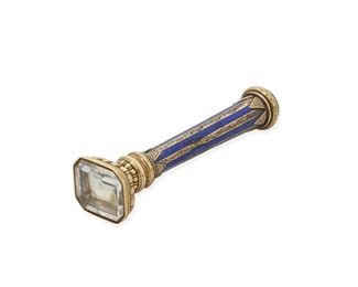 117
A Gold And Enamel Wax Seal
Late 19th century, 14k yellow gold
A 14k yellow gold and blue enamel body with an uncut crystal seal
4.5" H
#7512
Estimate: $600 - $800