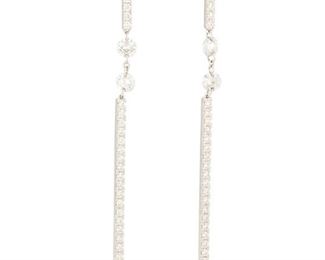 118
A Pair Of Diamond Earrings
18k white gold; Stamped: 59-2 / 18k / 750
Set with four round full-cut diamond beads totaling 0.39ct. in weight and sixty-two round full-cut diamonds totaling 0.41ct. in weight and each graded H-I color and SI clarity
2.125" H
2.9 grams
2 pieces
Estimate: $1,500 - $2,000