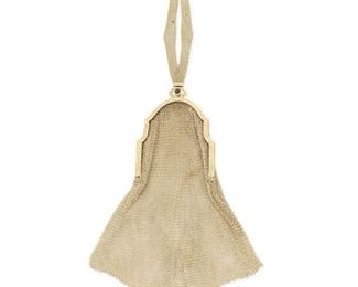 124
An Edwardian Gold Mesh Purse
14k yellow gold; Stamped: 14k / 5 / Maker's mark
An elongated mesh evening purse accented with two cabochon sapphires and terminating with a decorative tassel enhanced with two small seed pearls
Purse: 2.5" W x 8.5" H; Strap: 6.0" L
111.0 grams
Estimate: $3,000 - $5,000