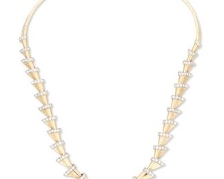 127
A Retro Gold And Diamond Necklace
Circa 1945, 18k rose and white gold; Stamped with Swiss hallmarks
A stylized chevron motif necklace set with one hundred-forty round full-cut diamonds totaling approximately 5.75cts. in weight and graded G-H color and VS/SI clarity with Swiss hallmarks
0.625" H x 18.0" L
60.5 grams
Estimate: $4,500 - $5,500