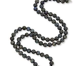 146
An Opal Bead Necklace
14k white gold; Stamped: 14k / 585 / KCJ
Comprising an opal in matrix bead strand necklace each gauged at approximately 5.3mm in diameter finished with a 14k white gold sphere clasp set with eight round full-cut diamonds totaling approximately 0.03ct. in weight
19.5" L
20.5 grams
Estimate: $500 - $700